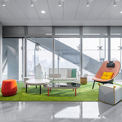 A room with a table chairs and a couch.